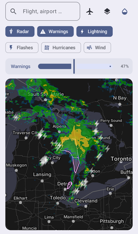 The demo app's opacity row: a layer picker and slider above the map, with warnings at 47 percent